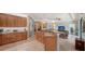 Open concept kitchen with stainless appliances, view to the living room at 20590 Granlago Dr, Venice, FL 34293