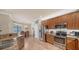 Well-equipped kitchen with stainless steel appliances and granite countertops at 20590 Granlago Dr, Venice, FL 34293