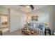 Comfortable living room area with nice furniture and a ceiling fan at 20590 Granlago Dr, Venice, FL 34293