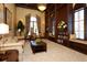 Inviting community lounge with comfortable seating and bookshelves at 20590 Granlago Dr, Venice, FL 34293