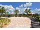 Beautiful patio cabanas and lounge seating offer luxurious outdoor living and relaxation at 20590 Granlago Dr, Venice, FL 34293