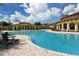 Stunning community pool and clubhouse offer residents a luxurious resort-style amenity at 20590 Granlago Dr, Venice, FL 34293