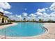 Expansive community pool area, with clear blue water perfect for recreation and relaxation at 20590 Granlago Dr, Venice, FL 34293