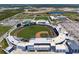 Aerial view of a baseball stadium and fields at 23499 Awabuki Dr # 102, Venice, FL 34293
