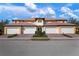 Four-unit building with attractive exterior and garages at 23499 Awabuki Dr # 102, Venice, FL 34293