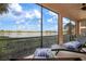 Relaxing lanai overlooking a peaceful lake at 23499 Awabuki Dr # 102, Venice, FL 34293