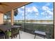 Spacious lanai with lake views and seating for entertaining at 23499 Awabuki Dr # 102, Venice, FL 34293
