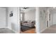 Home office with a comfortable couch and built-in shelving at 23499 Awabuki Dr # 102, Venice, FL 34293