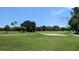 Expansive green golf course with sand traps and lush landscaping at 237 Venice East Blvd, Venice, FL 34293