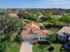 Single-Gathering home with a tile roof in a residential neighborhood at 249 Rio Terra, Venice, FL 34285