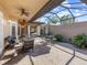 Private courtyard with seating area and covered patio, ideal for relaxation at 249 Rio Terra, Venice, FL 34285