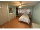 Light and airy bedroom with a double bed and built-in dresser at 269 Outer Dr, Venice, FL 34285