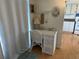 Small home office with wicker desk and chair at 269 Outer Dr, Venice, FL 34285