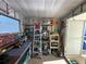 Workshop with shelving, workbench, and various tools at 269 Outer Dr, Venice, FL 34285