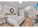 Spacious bedroom with large bed, nightstands, and ample natural light at 3162 Cordova Ter, North Port, FL 34291
