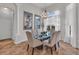 Bright dining room with a glass-top table and neutral decor at 3162 Cordova Ter, North Port, FL 34291
