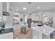 Modern kitchen featuring white cabinetry, an island, and stainless steel appliances at 3162 Cordova Ter, North Port, FL 34291