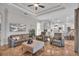 Spacious living room with gray sofas, a coffee table and an open layout at 3162 Cordova Ter, North Port, FL 34291