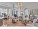Spacious living room with ample natural light and elegant furnishings at 3162 Cordova Ter, North Port, FL 34291