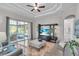 Bright living room, featuring comfy seating, a large TV and access to a patio at 3162 Cordova Ter, North Port, FL 34291