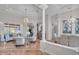 Elegant living room with a formal seating arrangement and large windows at 3162 Cordova Ter, North Port, FL 34291