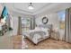 Large main bedroom with a king-size bed and plenty of natural light at 3162 Cordova Ter, North Port, FL 34291