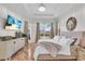 Bright and airy main bedroom with a king bed and large windows at 3162 Cordova Ter, North Port, FL 34291