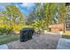 Brick paved patio with grill and seating area at 3162 Cordova Ter, North Port, FL 34291