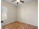 Bedroom with wood-look floors and ample natural light at 3324 Stockton Ave, North Port, FL 34286