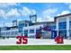 A spring training baseball stadium complex featuring modern architecture, ticket windows, and signage at 340 N River Rd, Venice, FL 34293