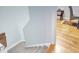 View of carpeted stairs, hardwood floors, and stylish interior design at 340 N River Rd, Venice, FL 34293