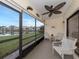 Screened lanai overlooking a peaceful lake at 340 Three Lakes Ln # K, Venice, FL 34285