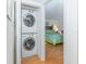 Stackable washer and dryer in convenient laundry closet at 340 Three Lakes Ln # K, Venice, FL 34285
