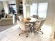 Cozy dining area with round wooden table and four chairs at 346 Mariner Dr, North Port, FL 34287