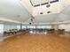 Spacious event venue with hardwood dance floor and ample seating, perfect for large gatherings at 346 Mariner Dr, North Port, FL 34287