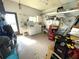 Laundry room featuring a sink, washer, dryer, and storage shelving throughout at 346 Mariner Dr, North Port, FL 34287