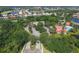 An aerial shot of the Sawgrass neighborhood, showcasing lush greenery and water features at 357 Marsh Creek Rd, Venice, FL 34292