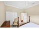 This bedroom features neutral walls, and a four-poster bed at 357 Marsh Creek Rd, Venice, FL 34292