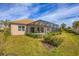Exterior view of the home with a screened-in pool and patio offering a private and relaxing outdoor space at 357 Marsh Creek Rd, Venice, FL 34292