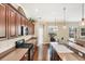Modern kitchen features custom cabinets, countertops, and stainless steel appliances at 357 Marsh Creek Rd, Venice, FL 34292