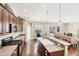Gourmet kitchen features custom cabinets, countertops, stainless steel appliances at 357 Marsh Creek Rd, Venice, FL 34292