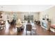 Spacious living room boasts hardwood floors, fireplace, and a bright, airy atmosphere at 357 Marsh Creek Rd, Venice, FL 34292