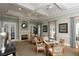 Inviting resident lounge area with cozy seating, fireplace, and elegant decor at 357 Marsh Creek Rd, Venice, FL 34292