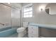Clean bathroom with a shower/tub combo and vanity at 407 Degas Dr, Nokomis, FL 34275