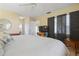 Comfortable bedroom with a king-size bed and views of the patio at 407 Degas Dr, Nokomis, FL 34275