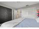 Relaxing bedroom with a king-size bed and access to a bathroom at 407 Degas Dr, Nokomis, FL 34275