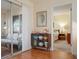 Bright living room with access to a sunroom and bedroom at 407 Degas Dr, Nokomis, FL 34275