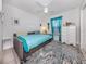 Guest bedroom with daybed and ceiling fan at 4251 Oak Terrace Cir, Port Charlotte, FL 33953