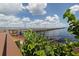Scenic view of the fishing pier from the shoreline at 4251 Oak Terrace Cir, Port Charlotte, FL 33953