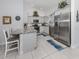 Modern kitchen with stainless steel appliances and granite countertops at 4251 Oak Terrace Cir, Port Charlotte, FL 33953